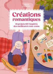 Couverture du livre "Créations romantiques" d'Anne Loiseau (Mango). Une illustration chaleureuse montre une femme brodant sur un canapé rose, entourée d'accessoires créatifs.