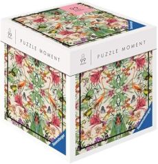 Boîte du puzzle Ravensburger Puzzle Moment Tropical 99 pièces avec illustration florale et exotique composée de plantes, fleurs colorées et oiseaux tropicaux sur fond clair.